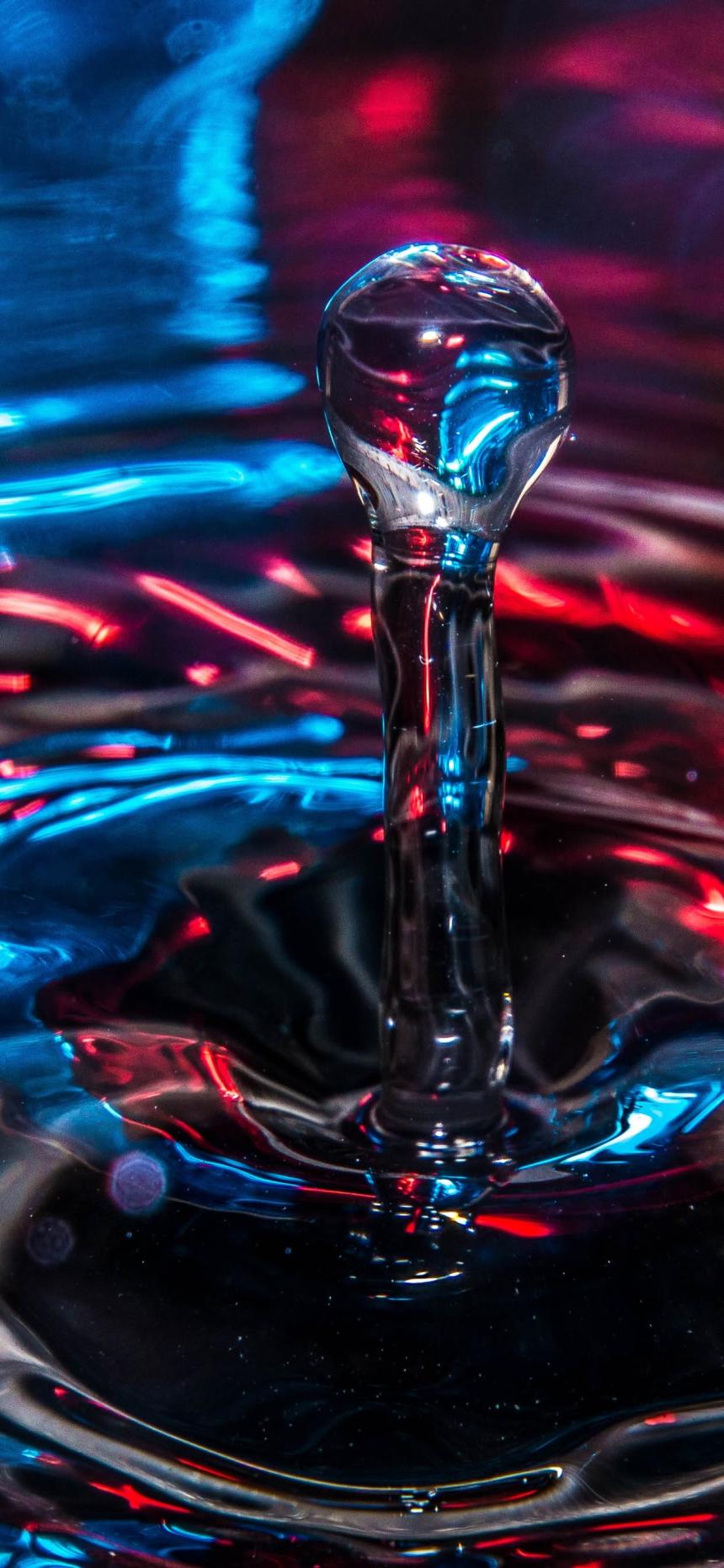Macro Neon Water Splash Wallpaper