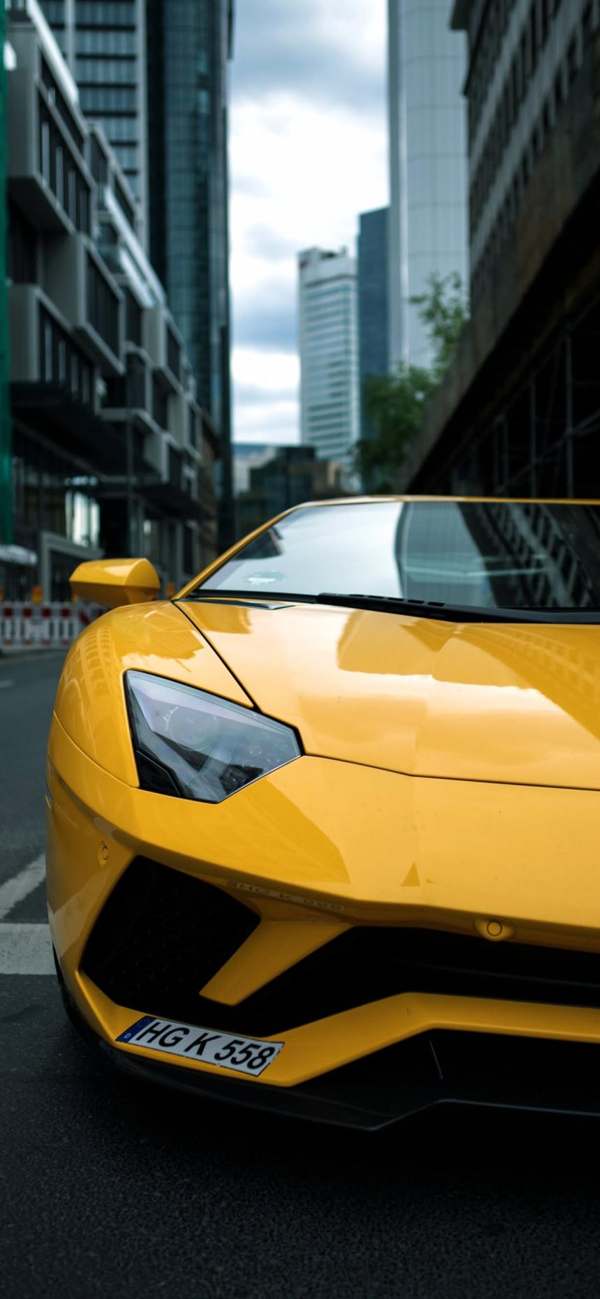 Yellow Lamborghini City Street Wallpaper