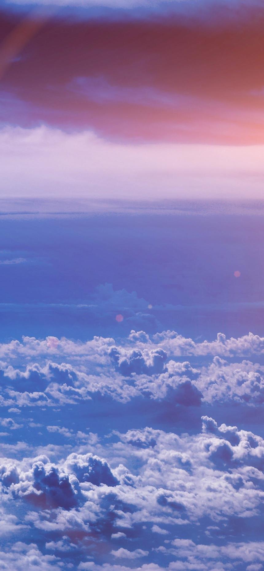 Aesthetic Cloud Wallpaper with Purple Sky and Pink Sunset Glow